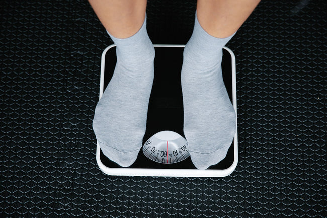 Athlete's feet on a bathroom scale